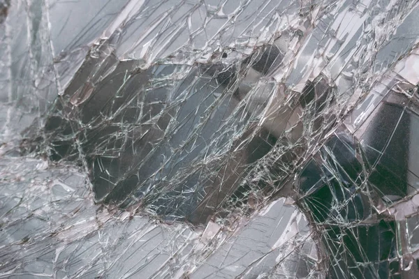 Sprucken glasstruktur. Ovanifrån spruckna trasiga bil glas konsistens bakgrund. — Stockfoto