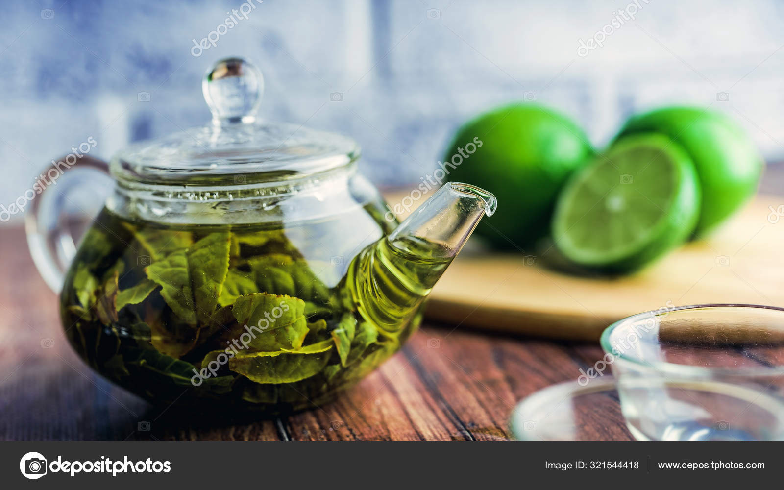 The Tea Leaves Are Brew In Boiling Water And Infuse In A Small Teapot The Concept Of The Tea Party Green Tea In A Teapot Stock Photo By C Epidemiks 321544418