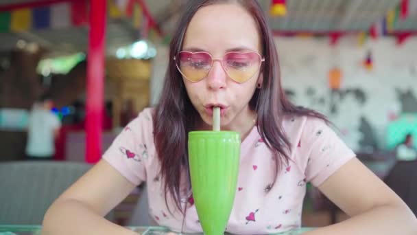 Beautiful Young Woman Drinking Healthy Smoothie — Stock Video