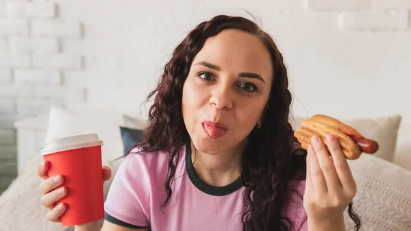 Female Eats Juicy Hot Dog Cozy Bedroom Concept Temptation Diet — Stock Photo, Image