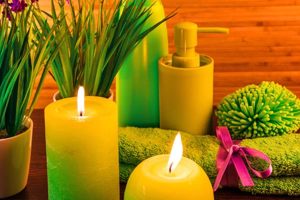 Macro view of green spa bath products concept with candles — Stock Photo, Image