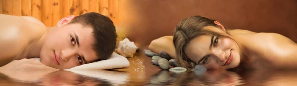 Schön liegende Frau und Mann in einem Wellness-Salon mit Wasserreflektoren — Stockfoto