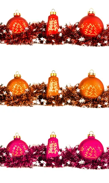 Комплект зимних праздников, красные, оранжевые и пурпурные шарики и гирлянды — стоковое фото