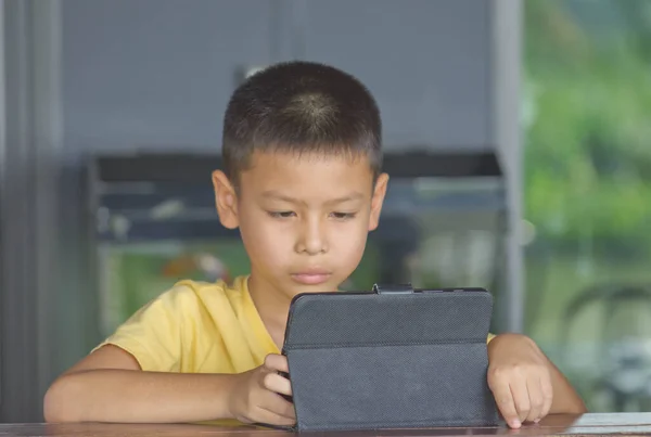 Portrait Asian Boy Playing Mobile Phone Wood Table Stok Foto Bebas Royalti