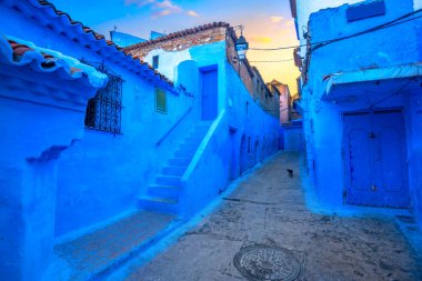Colourful houses with blue painted walls in old medina of Chefchaouen. Morocco, North Africa clipart