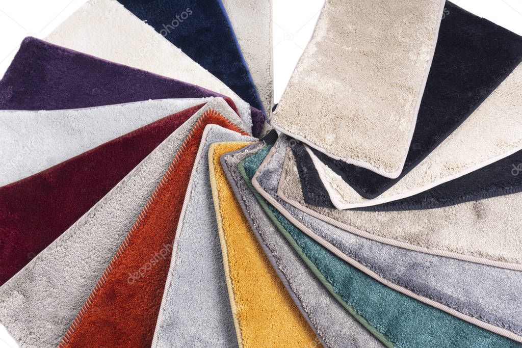 Types and samples of carpets in different colors. Carpets for ro