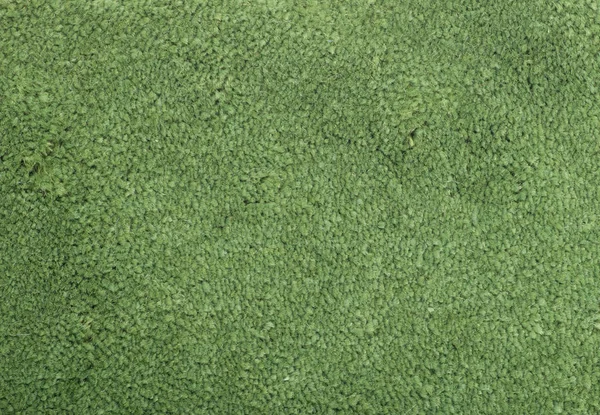 Alfombra que cubre el fondo. Patrón y textura de la alfombra verde . —  Fotos de Stock