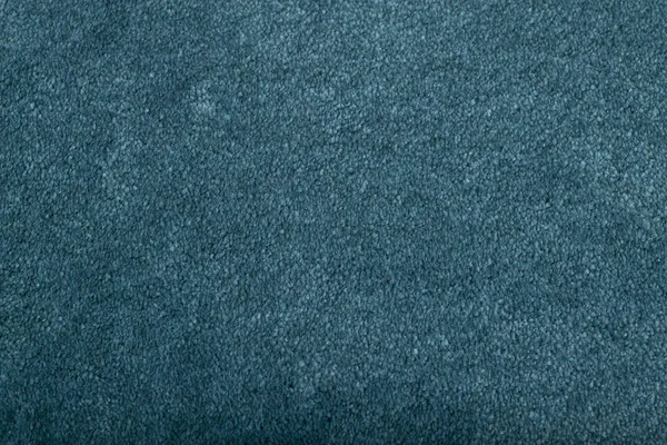 Tapijtbedekking achtergrond. Patroon en textuur van blauw tapijt. — Stockfoto