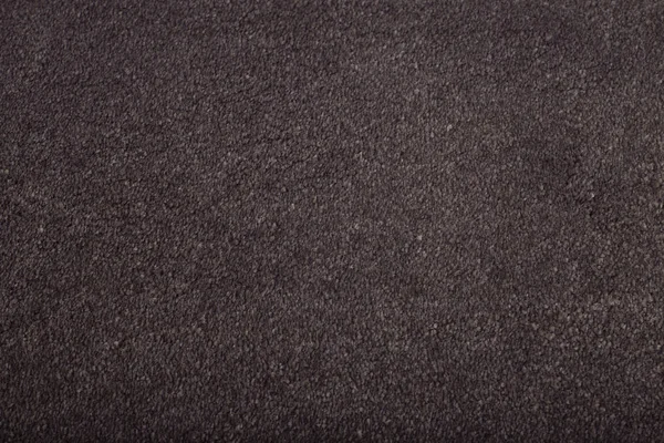 Tapijtbedekking achtergrond. Patroon en textuur van bruin tapijt. — Stockfoto