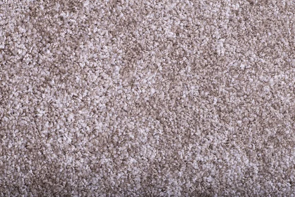 Carpet covering background. Pattern and texture of light brown c — Stock Photo, Image