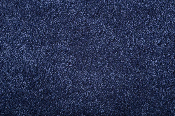 Tapijtbedekking achtergrond. Patroon en textuur van blauwe kleur ca. — Stockfoto