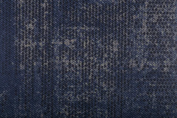 Carpet covering background. Pattern and texture of dark blue colour carpet. Copy space.