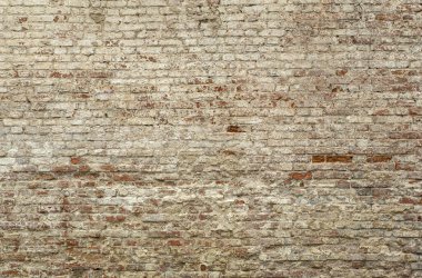 Eski tuğla duvar. Köy tarzında eski bir tuğladan yapılmış tuğla. Yıkılmış taş duvarın yapısı ve deseni. Boşluğu kopyala.