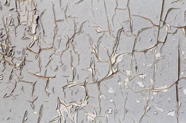 Eski boya arka planı. Duvardaki eski, kuru boyanın deseni ve dokusu. Eski boyanmış duvar arkaplanı.