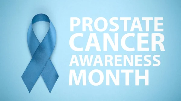 Prostate cancer awareness month. Blue ribbon on background. Blue ribbon symbol of world prostate cancer month and concept of healhcare.