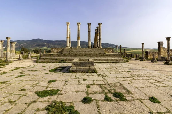 Capitoline Temple at archaeological Site of Volubilis, ancient Roman empire city, Unesco World Heritage Site — Stock Photo, Image