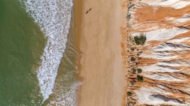 Aerial rocks and cliffs seascape shore view of famous Falesia beach, Algarve clipart