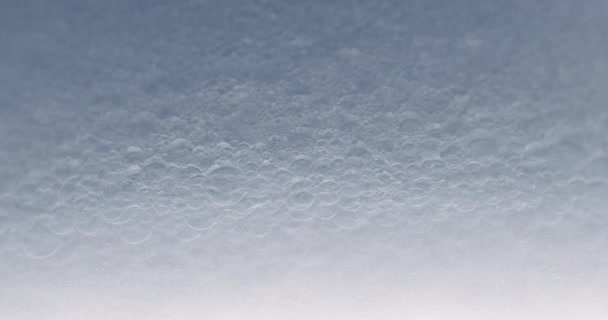 Bellissimo macro shot di schiuma bianca — Video Stock