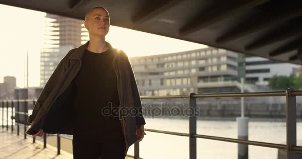 Happy Young Woman Buzz Cut Spinning Bridge Sunset — Stock Video