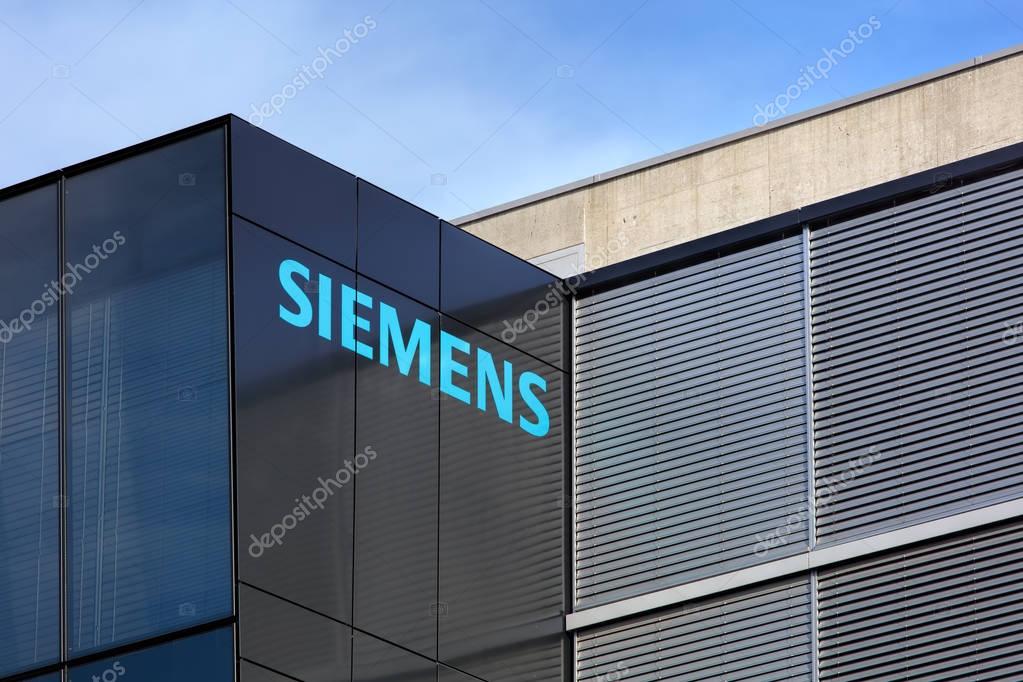 Wallisellen, Switzerland - 20 November, 2016: upper part of the Siemens office building. Siemens AG is a company headquartered in Berlin and Munich, it is the largest engineering company in Europe.