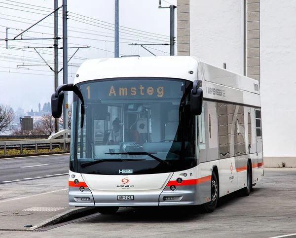 A Hess bus in Fluelen, Switzerland — Stock Photo, Image