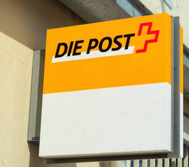 İsviçreli bir postane duvarında oturum