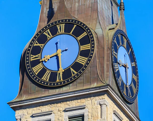 Clock on the tower of the St. Jakob Church in the city of Zurich — Stock Photo, Image