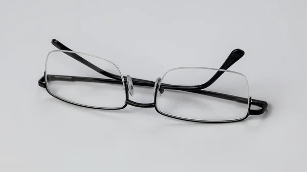 Glasses for vision on a light background. — Stock Photo, Image