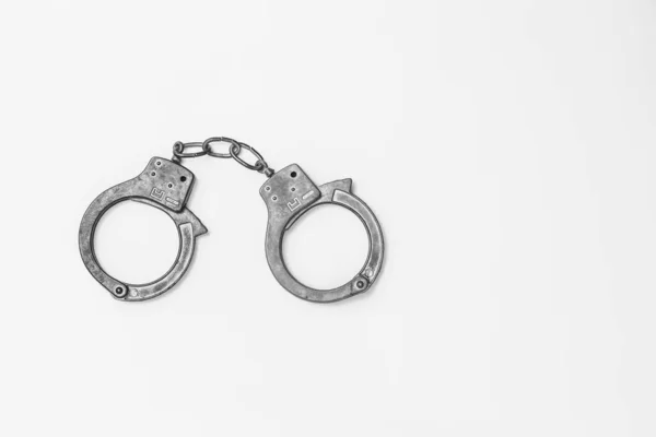 Handcuffs on white background isolate, copy space — Stock Photo, Image