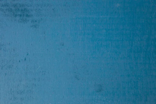 Der Holzhintergrund ist dunkelblau. — Stockfoto