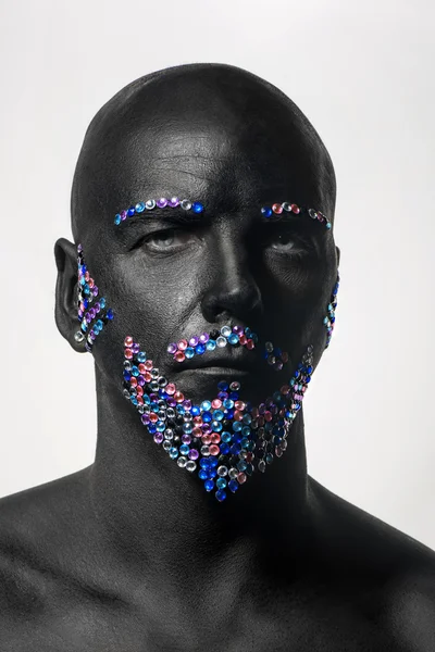 Man in paint and rhinestones — Stock Photo, Image