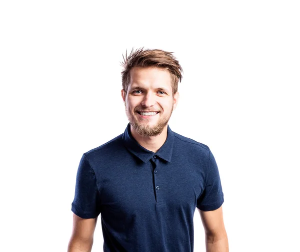 Hipster man in blue t-shirt, studio shot, isolated — Stock Photo, Image