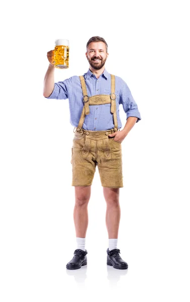 Man in traditionele Beierse kleding mok van bier houden — Stockfoto