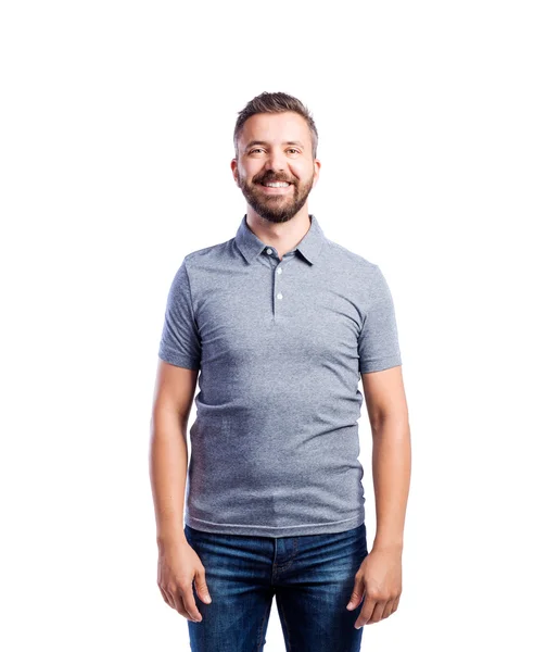 Hipster man in grijs t-shirt — Stockfoto