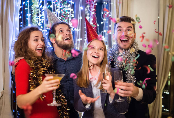 Group of friends having party on New Years Eve.