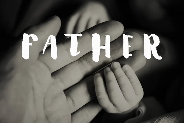 Hands of father and of newborn baby. Fathers day. — Stock Photo, Image