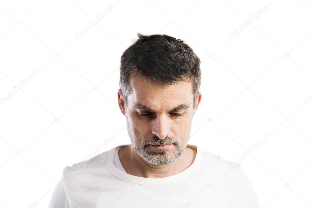 Mature hipster man in white t-shirt. Studio shot, isolated.