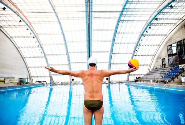 Water polo player in a swimming pool. — Stock Photo, Image