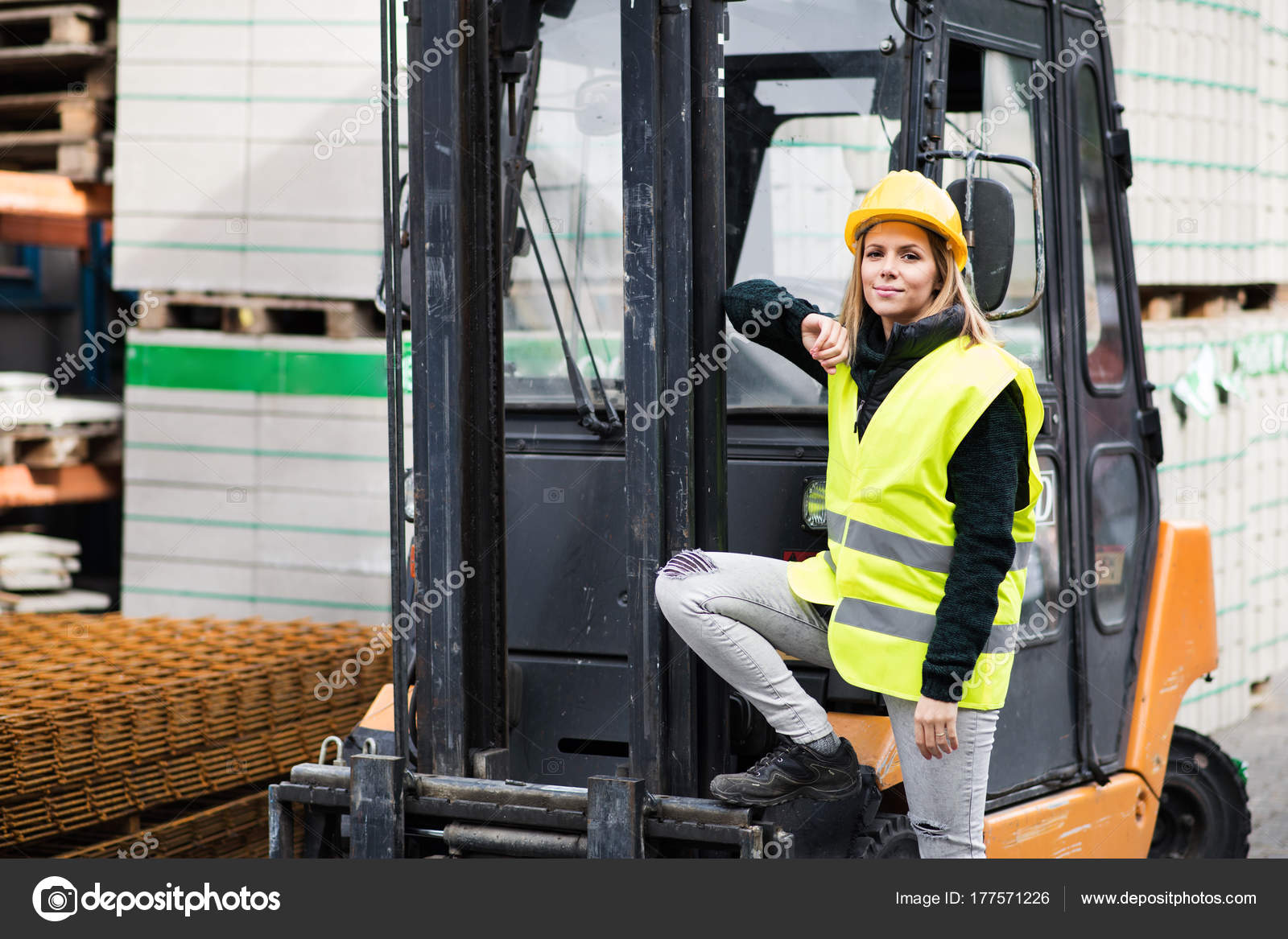 relaxed relieve visit Woman forklift truck driver in an industrial area. Stock Photo by  ©halfpoint 177571226