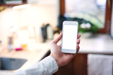 Smartphone ile boş beyaz ekran görüntüsünü mockup.