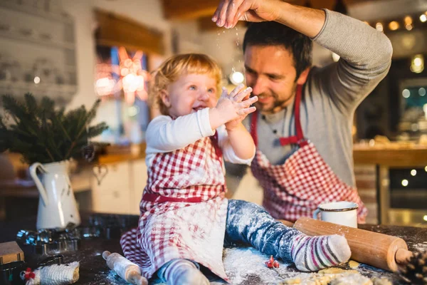 Young family making cookies at home. — Stock Photo, Image