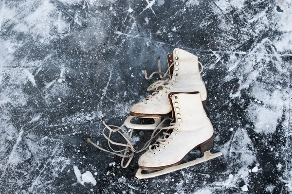 Old womans ice skates on the ice. Stock Image