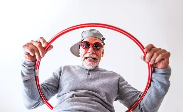 Senior man having fun at home. — Stock Photo, Image