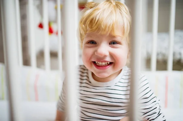 Cute toddler boy in the bedroom. Close up. — Stock Photo, Image