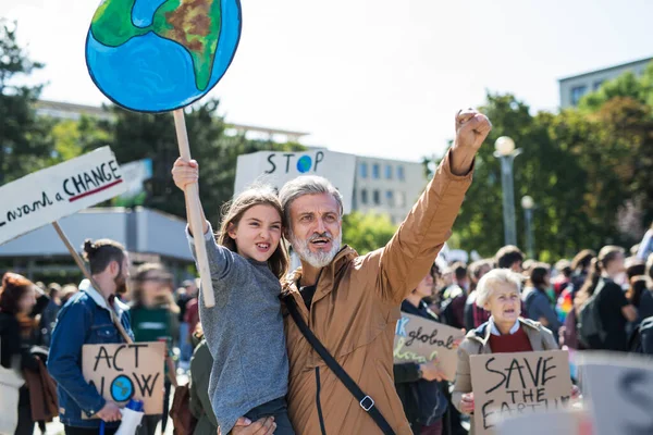 People with placards and posters on global strike for climate change. — Stock Photo, Image