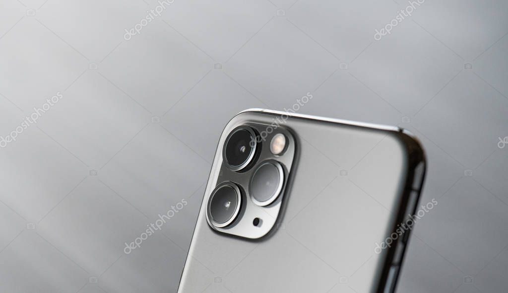 NOVA BANA, SLOVAKIA - NOV 12, 2019: A close-up of new Apple iPhone 11 Pro smartphone on desk.