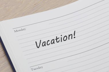 Vacation diary reminder open on desk