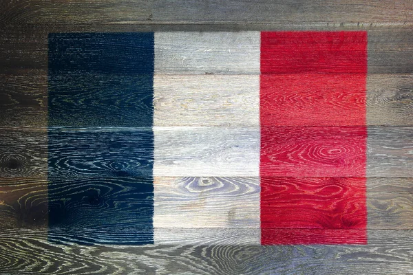 旧木表面底座上的法国国旗 — 图库照片