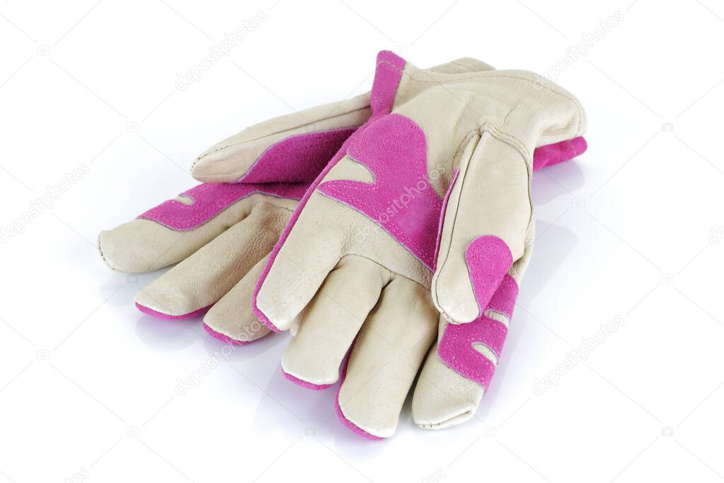 Pink garden gloves isolated on white background