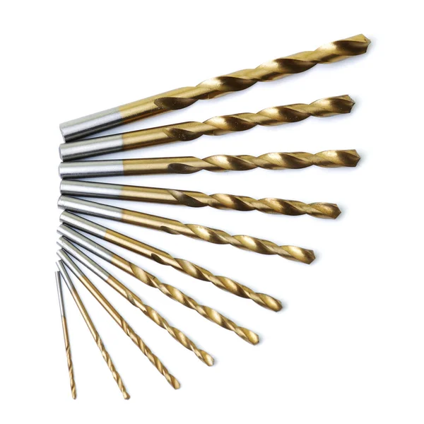 Top view of a set of drill bits on a white background — Stock Photo, Image